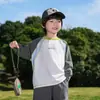 Camiseta de Manga Larga para Niños 2026 Primavera Nuevo Color Bloqueado Raglán Estilo Montaña Camping al Aire Libre Algodón Puro para Niños Versátil