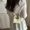Bolso mini de diseño de nicho dulce y lindo para mujer, bolso de luna 2026, bolso cruzado de PU, bolso de mano accesorio para padres e hijos