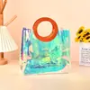 Bolso de PVC Personalizado Bolsa de Regalo de Plástico Transparente Láser Bolso Redondo Empaque Festivo Bolsa de Compras de Gama Alta