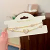 Moderna Moda de Lujo Ligero con un Toque de Alta Gama, Pulsera Doble Capa de Concha de Estrella y Luna con Circonita Super Brillante, Accesorio de Mano Versátil de Nicho para Mujeres