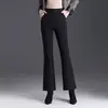 Pantalones acampanados casuales elásticos gruesos con terciopelo para mujer 2026 nuevo estilo otoño e invierno temperamento caída versátiles de nueve puntos pantalones microacampanados