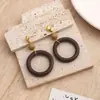 Pendientes de Madera Geométricos Transfronterizos Europeos y Americanos para Mujer, Pendientes de Madera Redondos con Diseño Hueco Exagerado Simple Retro Venta al por Mayor
