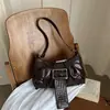 Otoño 2026 Nuevo Elegante de Nicho Bolso de Mano para Motocicleta Bolsa de Silla de Montar para Mujer Elegante Versátil de Moda Bolso de Hombro Único
