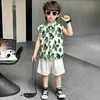 Conjunto de Camisa sin Mangas con Estampado de Hojas de Verano para Niños 2026 Nuevo Estilo Coreano Conjunto Elegante de Dos Piezas para Niños Ropa de Bebé Exportación
