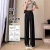 Pantalones negros de pierna ancha para mujer, nueva colección primavera 2026, con un diseño recto, de cintura alta, fluido, casual y versátil que estiliza y es ligero, resembling a suit pant
