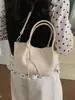 Bolso de Cubo Tejido de Alta Gama para Mujer 2026 Nuevo Estilo Coreano Bolso de Hombro Cruzado para el Trabajo Moda Elegante Bolso Plateado para Mujer