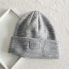 Gorro de punto Sombrero de estilo coreano para hombre Marca de moda Gorro puntiagudo de lana blanca Etiquetado Sombrero para el frío Sombrero sencillo para estudiante para mujer