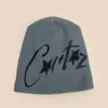 Chapéu de Tricô Estrela de Cinco Pontas com Letra Estilo Americano Nicho para Cruzeiro Outono e Inverno para Homens e Mulheres Quente Hip-Hop Chapéu para Frio Chapéu Pulôver Venda por Atacado