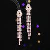 Aretes de alta gama de lujo ligero con incrustaciones de circonita ultrafash, elegantes aretes largos de borla para afinar el rostro, aretes de moda al por mayor