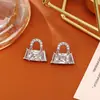Elegantes aretes de bolso de zirconia morada, de alta gama, modernos, exquisitos y elegantes, joyería para mujer con un aura de nueve fuegos púrpuras