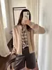 Han Xun visual em camadas xadrez patchwork falso duas peças gola alta cardigã de malha solta coleção outono 2026 27525