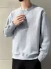 Camiseta de Manga Larga de Marca de Moda para Primavera y Otoño para Hombre Jacquard Casual Cuello Redondo Sudadera de Punto Top Suelto Atractivo y Versátil