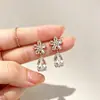 Aretes de flor de circón estilo coreano para mujer, aretes de gota de agua de lujo de alta gama, aretes de aguja plateada de moda y elegantes, de moda