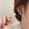 Corea del Sur Dongdaemun Nueva Camelia Pendientes de Flor de Hada con Aguja de Plata 925 Pendientes para Combinar con Ropa Pendientes de Moda