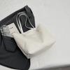 Bolso de mano texturizado estilo coreano para ir al trabajo 2024 Invierno nuevo casual simple de hombro axilar bolso tote para mujeres