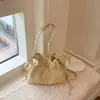 Bolsa Tote com Cordão Chic de Nicho Feminina Primavera 2026 Nova Simples Estilo Preguiçoso Temperamento Bolsa de Ombro Único para o Dia a Dia Tendência