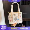 Bolsa Graffiti Exquisita para Mulheres 2025 Novo Estilo Versátil Bolsa de Ombro Grande Capacidade Tendência Bolsa Feminina Bolsa de Mão Transversal