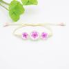 Pontos quentes transfronteiriços venda quente pulseira de narcisos de flor seca flor de cerejeira pulseira de cerâmica tecida à mão estilo doce fresco