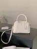 Bolsa Retro Esmerilada de Alta Gama 2026 Nueva Versátil para el Trabajo Bolso de Hombro Cruzado Exquisito Bolso de Mano Tipo Bowling