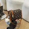 Bolsas de Luxo para Mulheres 2026 Novo Estilo Monograma para o Dia a Dia Bolsa Caixa de Luxo Leve Bolsa Transversal com Estampa Retrô Versátil