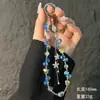Nueva Cadena para Teléfono Móvil de Cristal Gota de Agua Estilo Lujo Ligero Flor Circonita Borla Cadena para Colgar Teléfono Móvil Llavero Colgante para Bolso Comercio Exterior