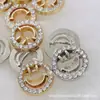 Botón de metal de alta gama hebilla de camisa cara sonriente hueca hebilla decorativa linda hebilla de diamante para niños tridimensional exquisita moda para niñas