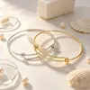 Pulsera Redonda Push-Pull Moda y Sencilla Acero Inoxidable Alex Alambre Ajustable Brazalete Fabricante Mayorista