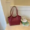 Bolso grande de Shuai Mi Jia para mujer 2026 nuevo bolso de hombro de nicho para el trabajo para estudiantes universitarios que van a clase bolso tote