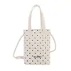 Linda mini bolsa de lunares femenina color caramelo fresco 2026 nueva versátil casual bandolera para teléfono