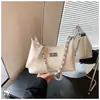 Bolsa de Axila Estilo Pequena Fragrância Super Quente Transfronteiriça Feminina 2026 Nova Versátil Bolsa Dumpling com Corrente Alta Aparência Moda Bolsa Transversal