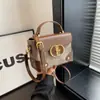Bolso pequeño popular de este año para mujer, moda versátil 2023, nuevo bolso bandolera vintage, caja portátil, bolso cuadrado pequeño