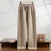 Nuevos pantalones rectos de cachemira con cordón para otoño e invierno para hombre, engrosados con capa de aire, pantalones casuales de corte recto con costura central, fluidos y versátiles