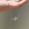 Colar Duplo de Estrela-do-Mar Tendência e Fashion para Mulheres, Estilo Vintage de Luxo Leve com um Toque de Alto Padrão, Corrente de Clavícula de Estrela, Novo Modelo Popular de 2025