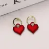 Corea del Sur Dongdaemun elegante celebridad de internet nicho diseño todo-partido hebilla de oreja femenina estilo coreano nuevo Pendientes de amor rojo femenino