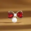 Broche Nuevo de Lazo Dulce con Perlas Estilo Chino, Pin de Solapa en Forma de Corazón de Lujo Ligero, Accesorio Anti-Exposición de Verano al por Mayor