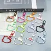 Chaveiro popular de gato KT com laço vazado, joia DIY, pingente, berloque, decoração de bolsa, acessórios, atacado