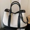 Bolsa de Mão Feminina de Luxo Transfronteiriça 2026 Nova Moda de Verão Versátil Bolsa de Ombro Grande Capacidade Bolsa Transversal para Mulheres