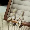 Nuevos Pendientes Largos de Hoja con Circonita 2025, Elegantes y Versátiles, Pendientes Exquisitos y Exagerados con Borlas y Ganchos de Plata S925