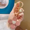 Chaveiro Criativo de Argila com Strass em Formato de Coração e Trevo de Quatro Folhas, com Grande Adorno de Strass, Charme da Sorte de Luxo Leve para Bolsas e Acessórios Femininos