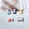 Lindo Moño de Flor Hecho a Mano DIY Pegamento de Crema Funda para Teléfono Móvil Tocado Pasador Joyería Accesorios de Resina Venta al por Mayor