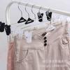 Fábrica direta branco triângulo calças rack coreano metal retrátil rígida calças acolchoadas clipe antiderrapante underwear clip underwear suporte