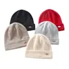 Sombrero de Cachemira Suave y Pegajoso 2026 Otoño/Invierno Nuevo Estilo Unisex Casual Protección para Orejas Sombrero de Color Sólido Moda Gorro de Punto