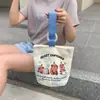 Venta al por mayor del fabricante Bolso de mano artístico de moda Bolso de lona Bolso tipo cubo de gran capacidad para mujer 2026 Nuevo Bolso para almuerzo de trabajo