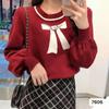 Otoño e Invierno 2023 nuevo suéter de cuello redondo manga abullonada Jacquard de lazo suelto estilo occidental top suave y lindo para mujer