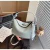 Bolso de mano vintage para mujer, nuevo para primavera-verano 2026, bolso de hombro y cruzado de nicho de alta gama para el día a día