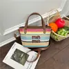 Bolsa de palha trançada estilo praia, nova moda de férias primavera-verão 2026, simples, trançada, de ombro, de mão, crossbody, modelo saco