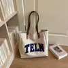Bolsa de gran capacidad para el día a día para mujer, nuevo estilo 2026, bolso tote casual para estudiantes universitarios, elegante bolso de hombro