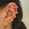 Set de Clip para Oreja Dorado de Nuevo Estilo Transfronterizo Europeo y Americano, Pendientes de Aleación Plateados Creativos Sencillos, Clip para Cartílago de la Oreja