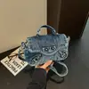 Bolsa Jeans Lavado Bolsa para Motocicleta Feminina 2026 Nova Leve Versátil Bolsa Transversal Pequena Quadrada de Mão para Uso Externo