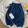 Calça Longa Infantil 2026 Outono Novidades Meninos e Meninas Calça de Moletom Estampada Bebê Estilo Coreano Cor Sólida Calça Longa com Punho na Barra Tendência